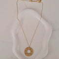 Collier en acier inoxydable pendentif cercle et strass