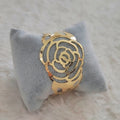 Bracelet manchette en plaqué or fleur