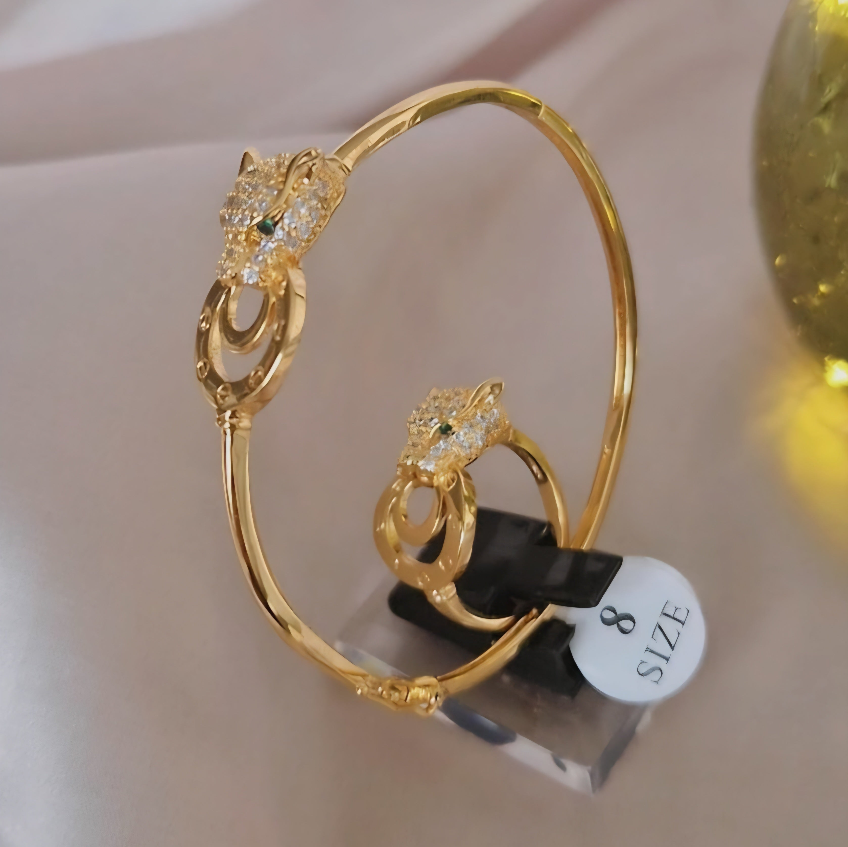 Ensemble bracelet jonc + bague assortis Jaguar et strass en plaqué or
