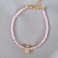 Bracelet fantaisie perles violettes Main de Fatma