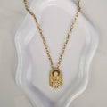 Collier beldi en acier inoxydable porte orientale Bab El Mansour motif Zellige