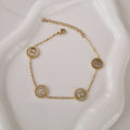 Bracelet en acier inoxydable multi cercles et nacre