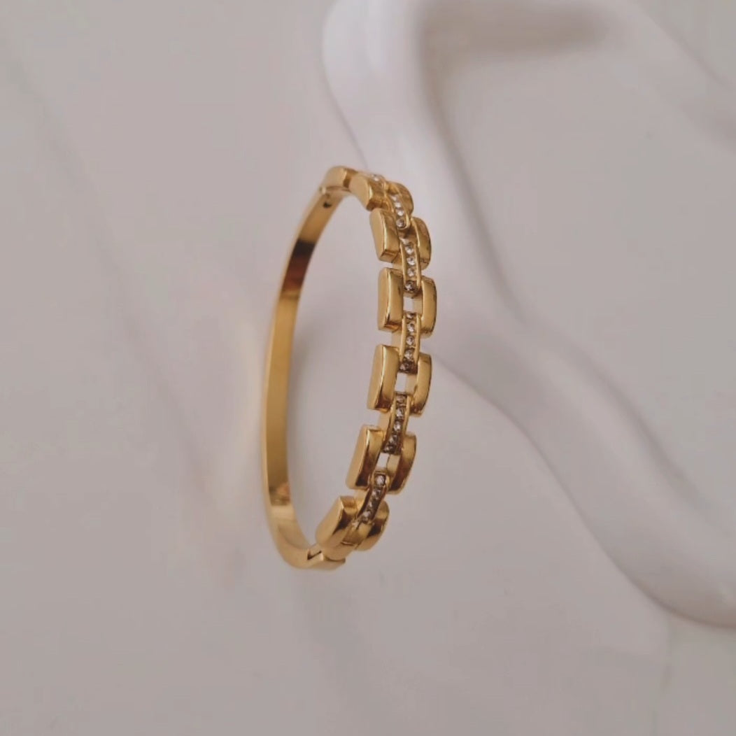 Bracelet jonc en acier inoxydable effet maille et strass