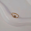 Bague ajustable en acier inoxydable enlacée et solitaire