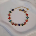Bracelet en acier inoxydable avec fleurs multi strass colorés