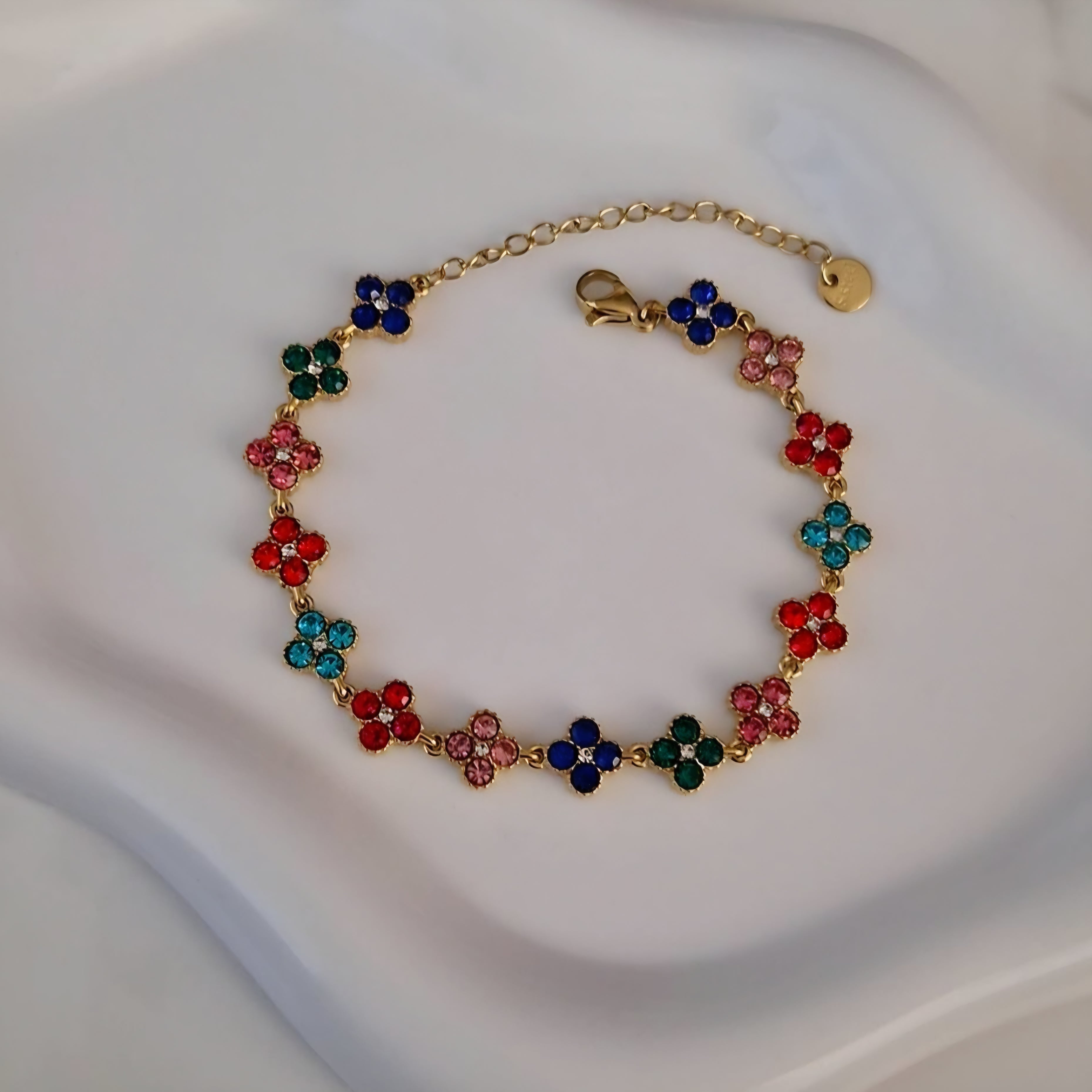 Bracelet en acier inoxydable avec fleurs multi strass colorés