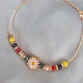 Bracelet fantaisie perles multicolores et Marguerite
