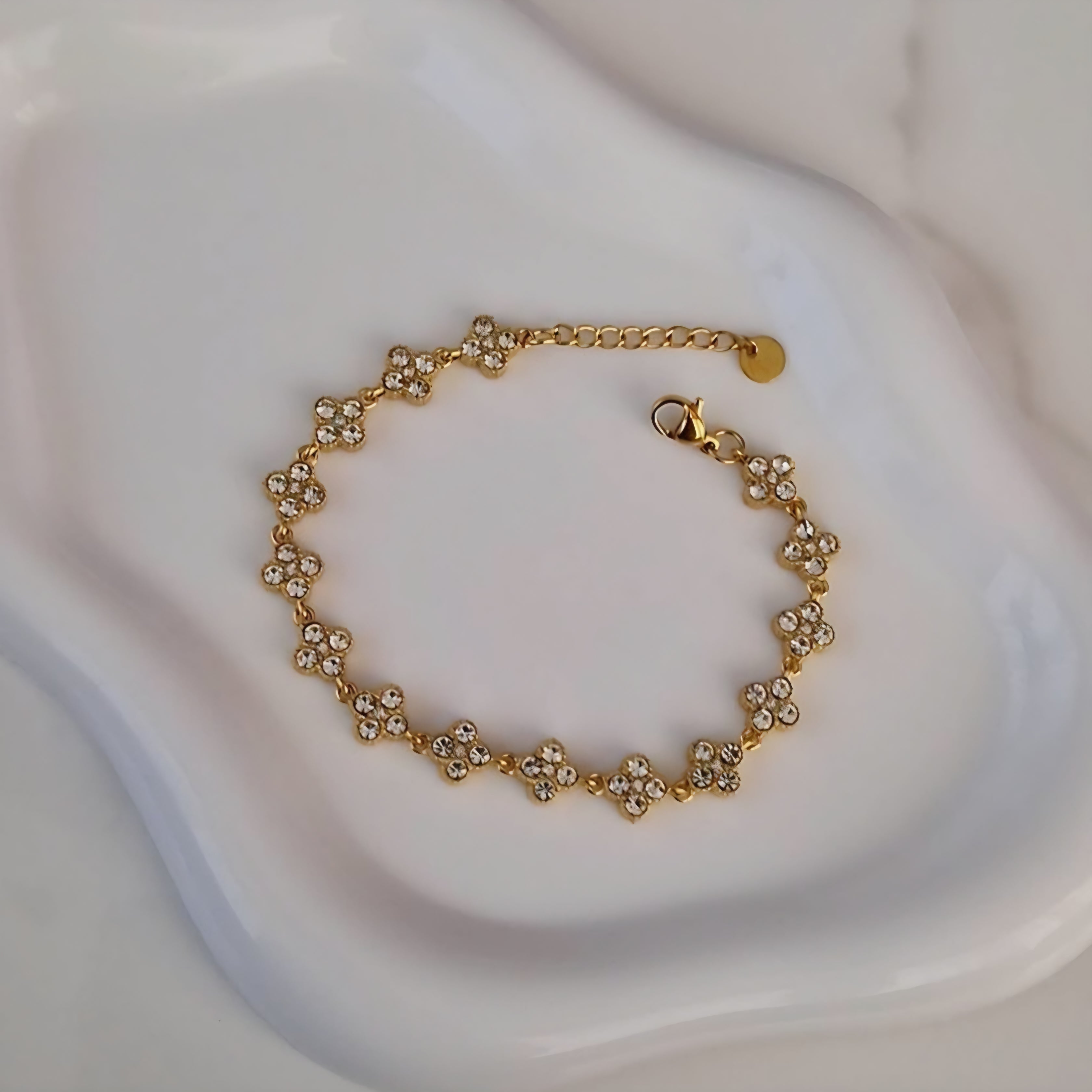 Bracelet en acier inoxydable avec fleurs multi strass