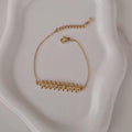 Bracelet en acier inoxydable ligne striée et strass